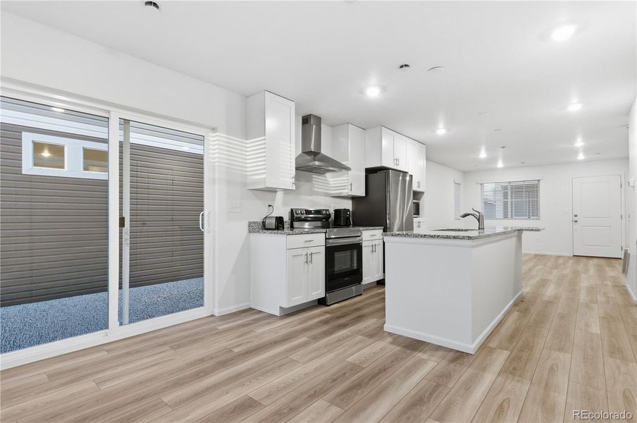 Furnished interior view inside a new home in Reunion, Commerce City (Image 7).