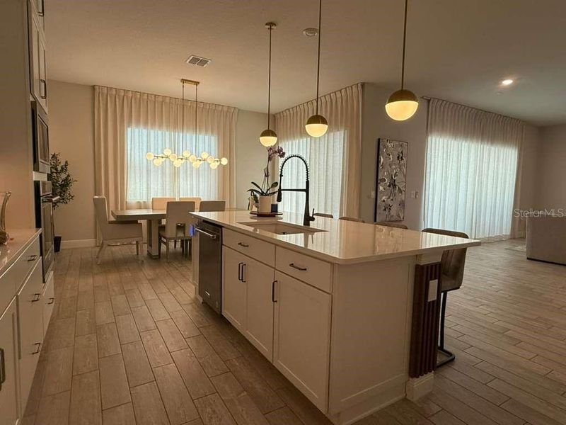 Furnished interior view inside a new home in Parkview Reserve, Orlando (Image 47).