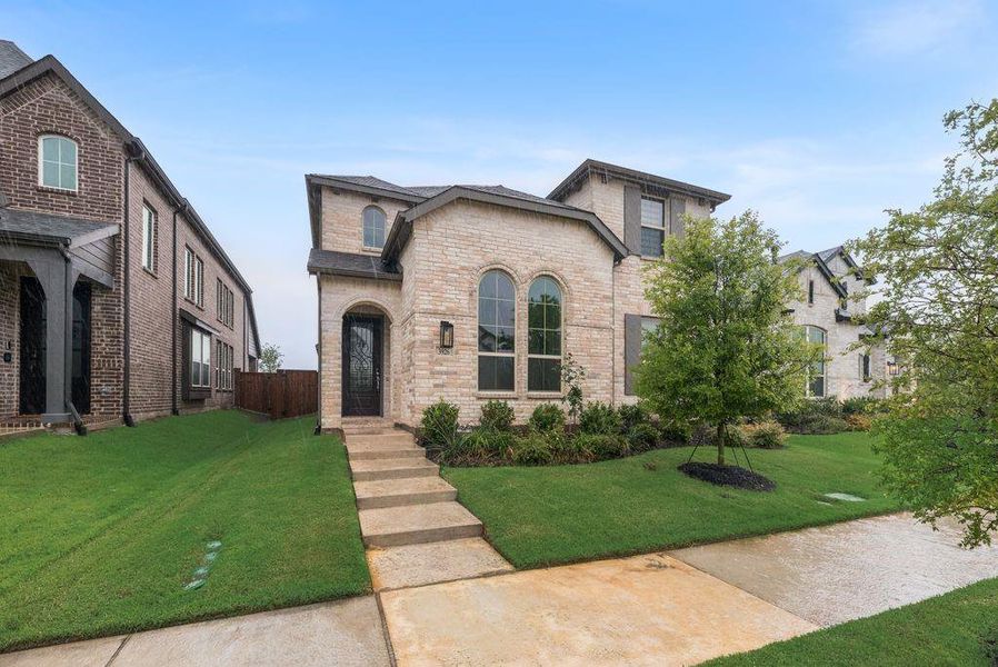 Front exterior of a new home in , Celina, TX, highlighting curb appeal (Image 18).