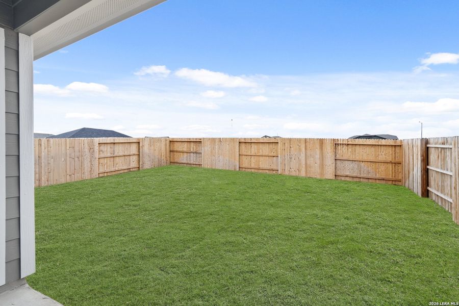 Exterior details and patio area of a home in Hickory Ridge, Elmendorf (Image 16).