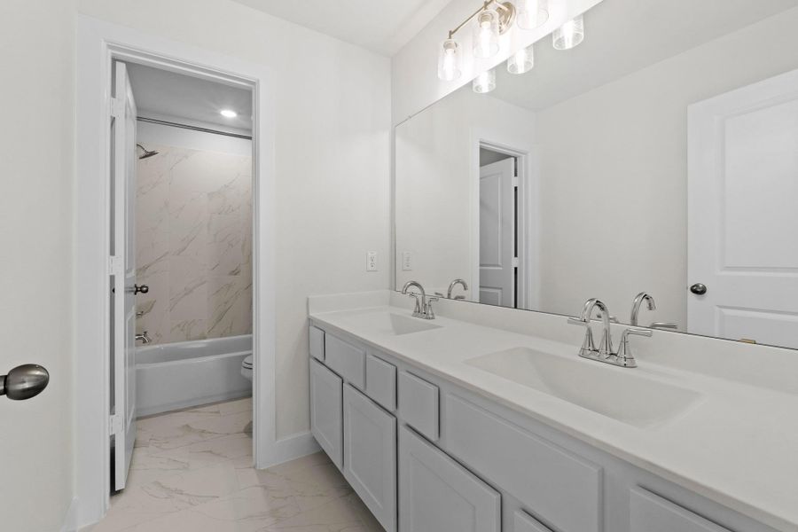 Furnished interior view inside a new home in Parmer Ranch, Georgetown (Image 7).