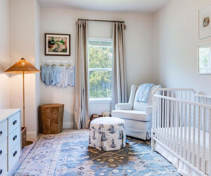 Bedroom with a nursery area