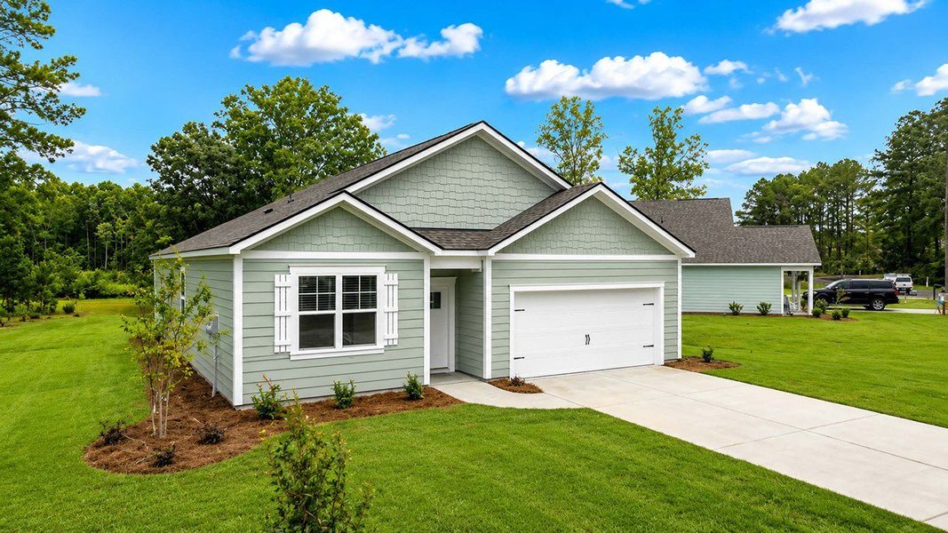 Front exterior of a new home in Rivers Reach, Yemassee, SC, highlighting curb appeal (Image 2).