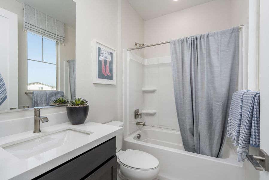 Representative furnished interior of a home built from the Monument by Risewell Homes in Citrus Park, Goodyear (Image 17).