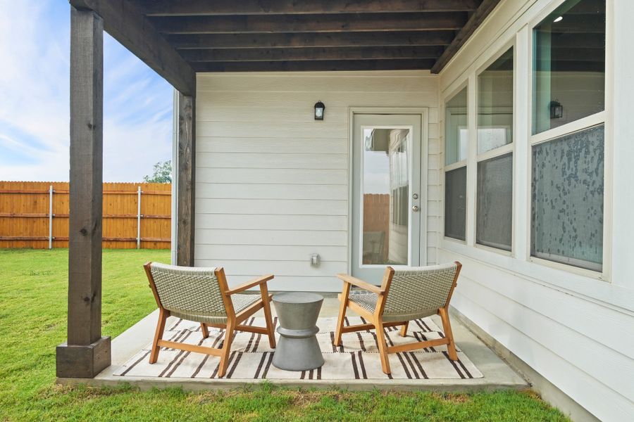 Patio in a Trinity Ranch Diamond Model in Elgin TX by Trophy Signature Homes