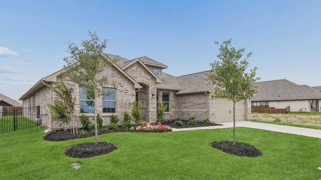 Front exterior of a new home in Silo Mills, Joshua, TX, highlighting curb appeal (Image 2). Front exterior of a new home in Silo Mills, Joshua, TX, highlighting curb appeal (Image 2).
