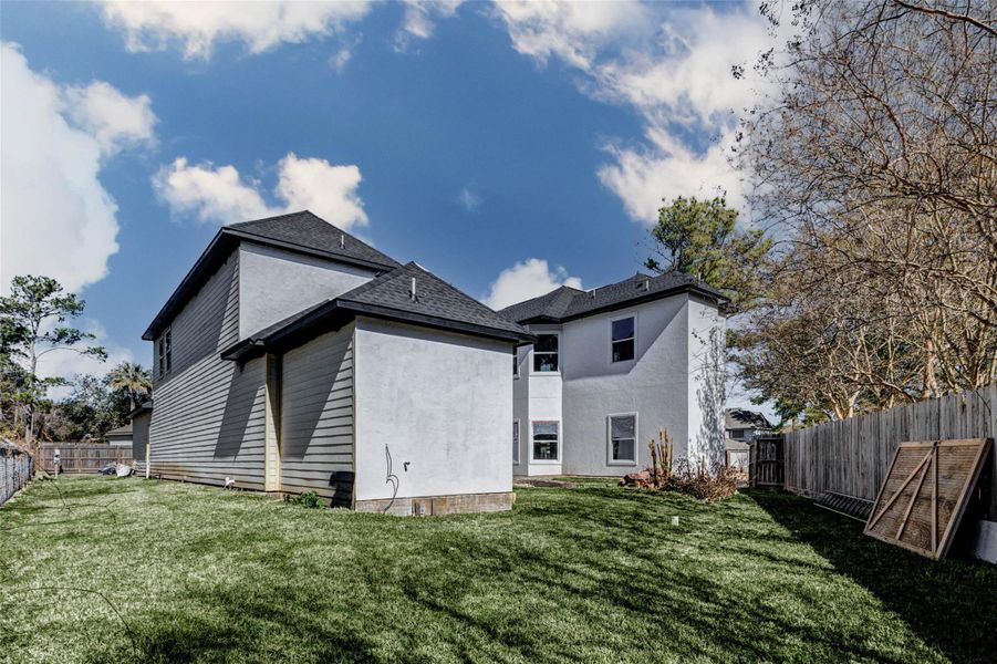 Exterior details and patio area of a home in , Spring (Image 10).