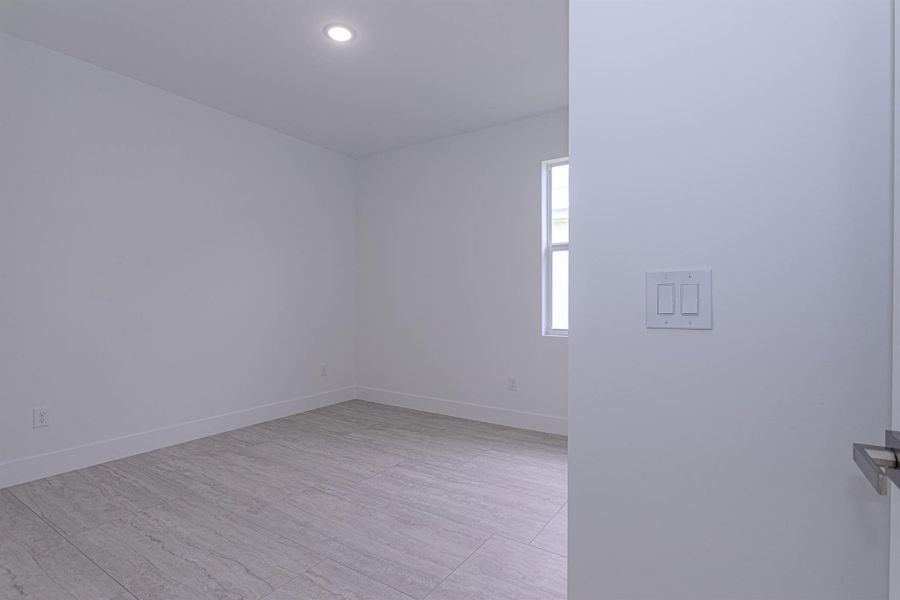 Spacious, unfurnished interior of a new home in , Jupiter (Image 23).