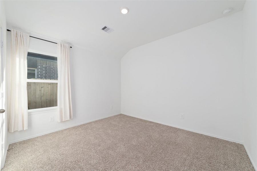 Spacious, unfurnished interior of a new home in Sunterra, Katy (Image 27).