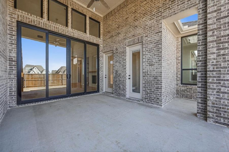 Exterior details and patio area of a home in Sandbrock Ranch: 70ft. lots, Aubrey (Image 2).
