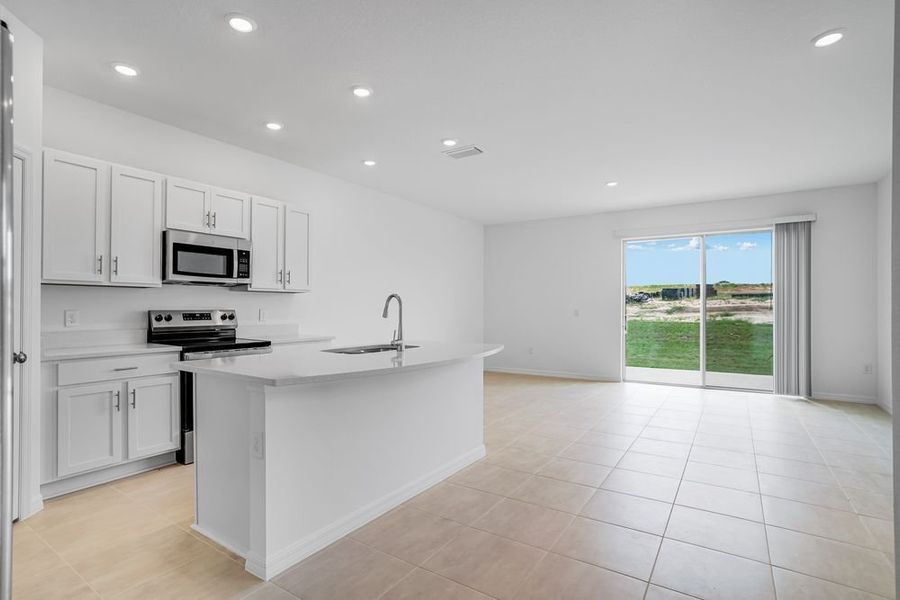 Furnished interior view inside a new home in Waterstone Townhomes, Groveland (Image 5).