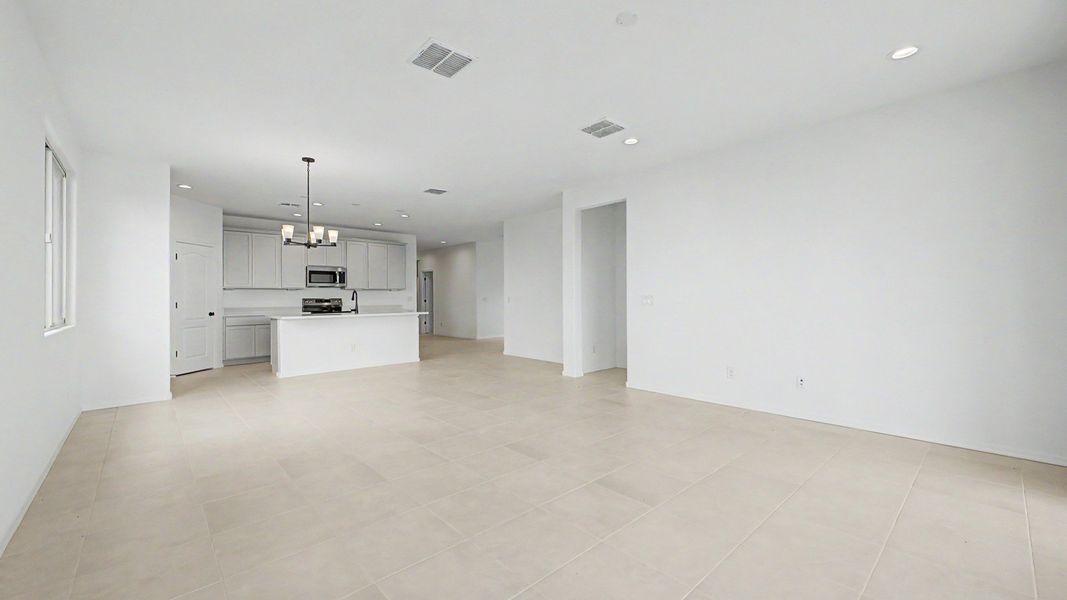 Great room of the move-in ready single-story Clover by DRB Homes at Sienna Park, 1315 S. 215th Drive, Buckeye, Arizona 85326. Great room of the move-in ready single-story Clover by DRB Homes at Sienna Park, 1315 S. 215th Drive, Buckeye, Arizona 85326.
