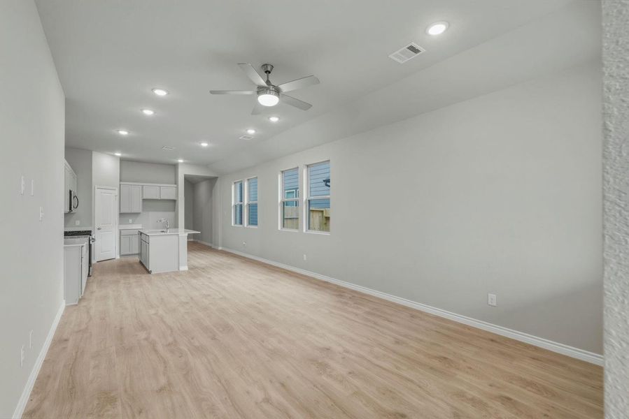 Dining and Living Area in the Cedar home plan by Trophy Signature Homes – REPRESENTATIVE P