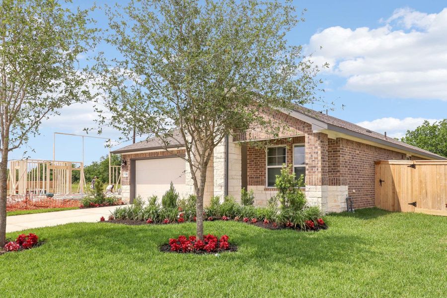 Front exterior of a new home in Massey Oaks - Premier Series, Pearland, TX, highlighting curb appeal (Image 25).