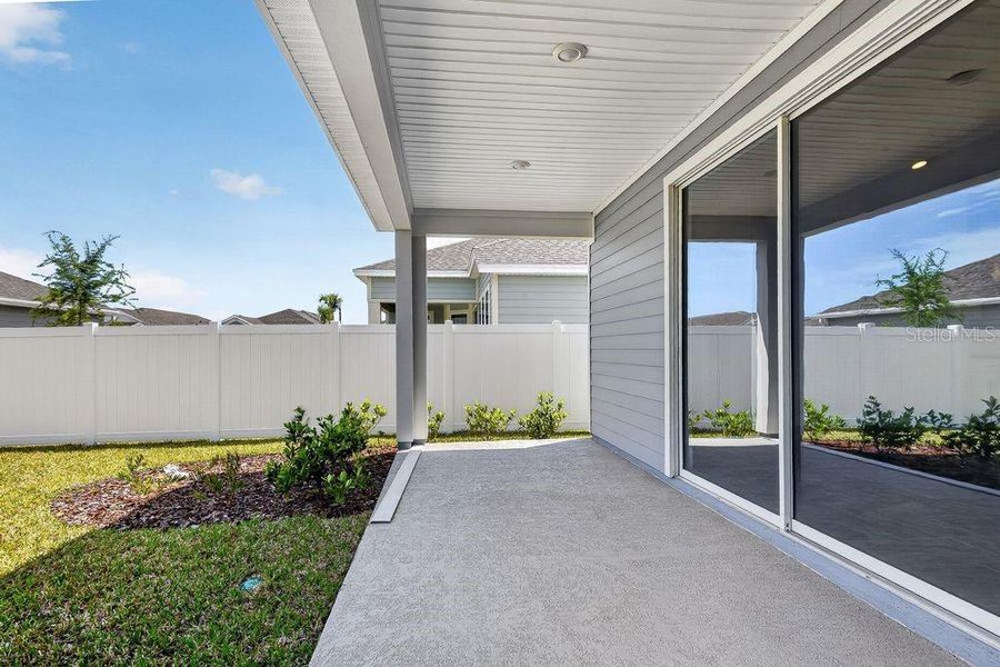 Exterior details and patio area of a home in Colbert Landings, Palm Coast (Image 19).