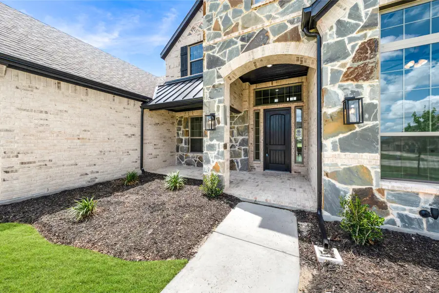 Exterior details and patio area of a home in Heritage, McLendon-Chisholm (Image 3).