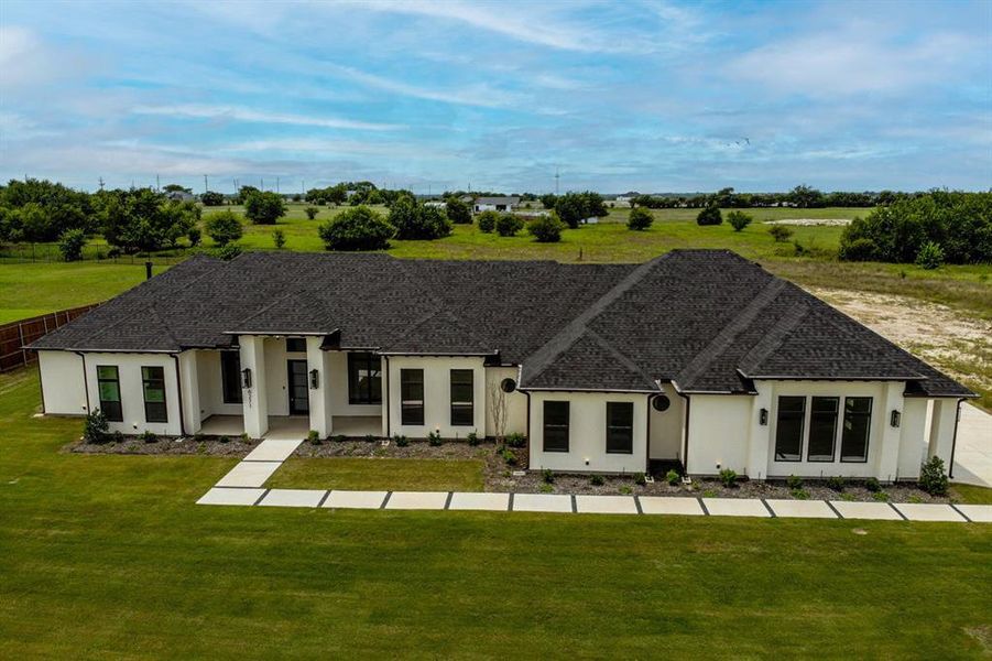 View of front of property featuring a front lawn