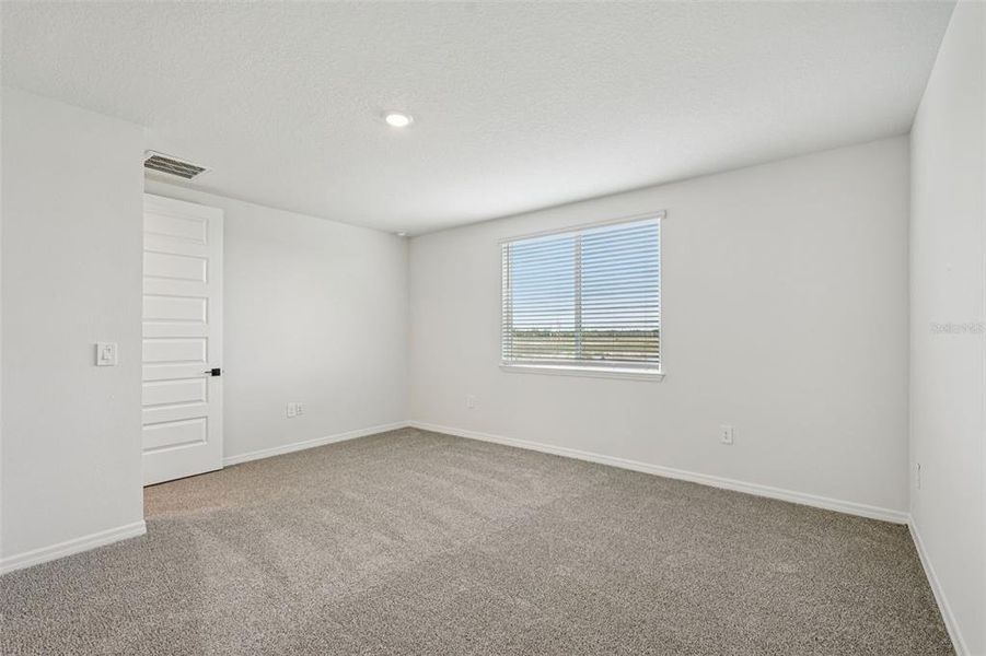 Spacious, unfurnished interior of a new home in Oakfield Trails - Signature Series, Parrish (Image 32).