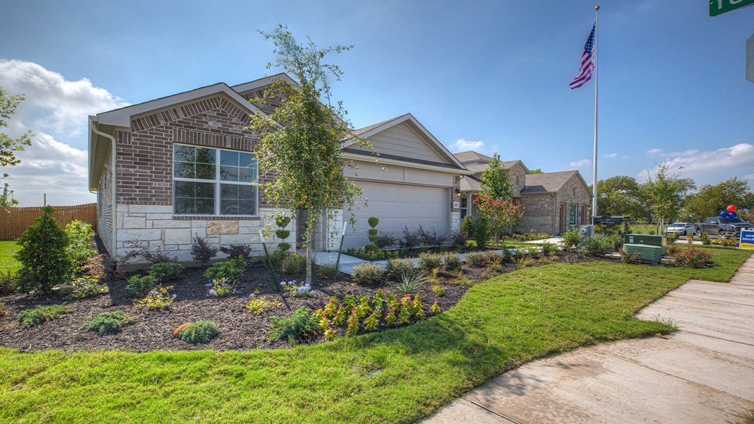 Representative exterior photo of a completed home built from the The Reagan by D.R. Horton in Southgrove, Kyle, TX (Image 24). Representative exterior photo of a completed home built from the The Reagan by D.R. Horton in Southgrove, Kyle, TX (Image 24).