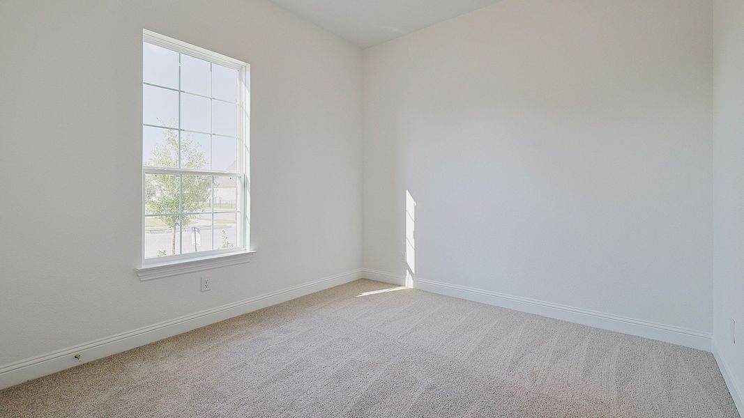 Representative furnished interior of a home built from the Villanova by Brightland Homes in Katy Lakes, Katy (Image 14).