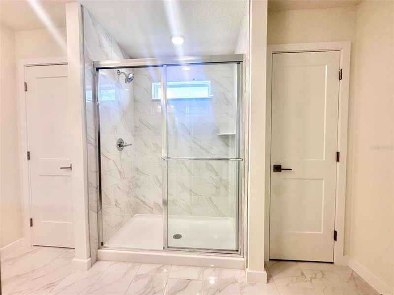Furnished interior view inside a new home in Grasslands West, Lakeland (Image 5).