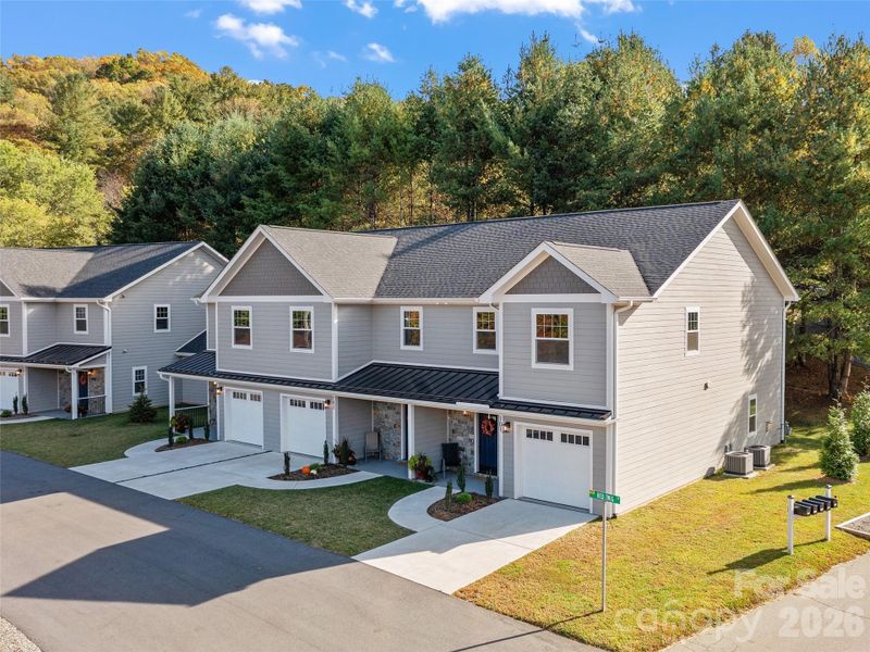 Front exterior of a new home in , Burnsville, NC, highlighting curb appeal (Image 19).