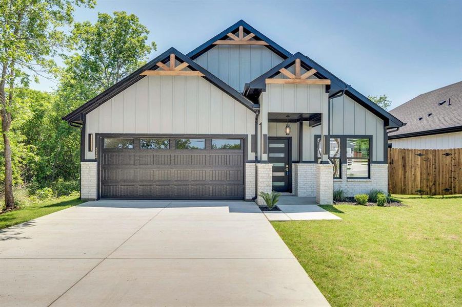 Front exterior of a new home in , Hillsboro, TX, highlighting curb appeal (Image 19).