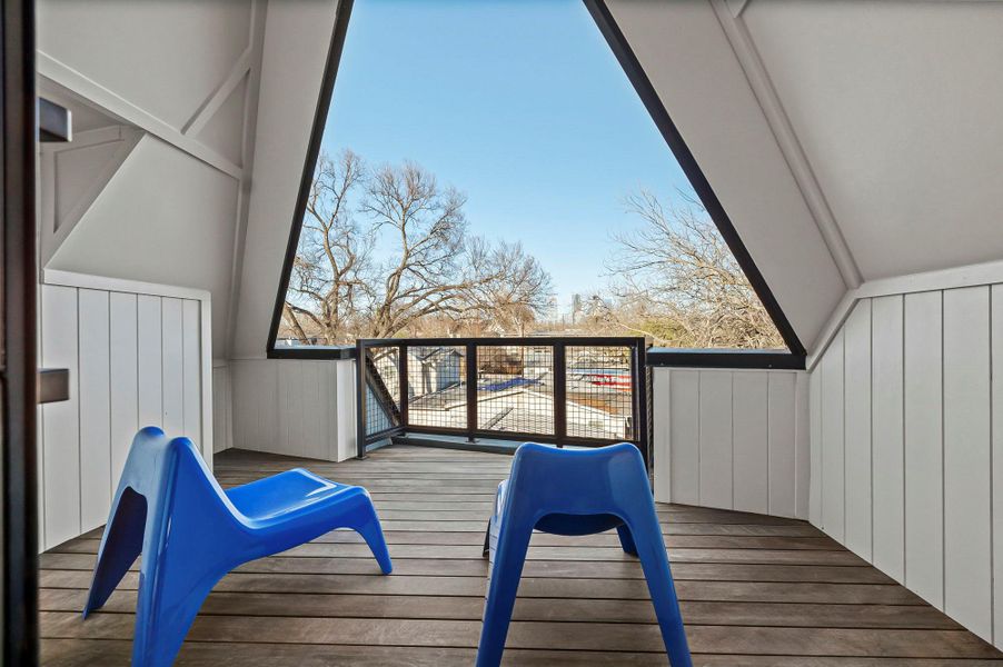 Covered balcony with views of downtown Covered balcony with views of downtown