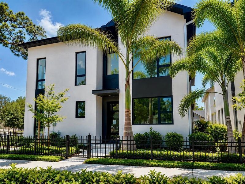 Front exterior of a new home in , St. Petersburg, FL, highlighting curb appeal (Image 2). Front exterior of a new home in , St. Petersburg, FL, highlighting curb appeal (Image 2).