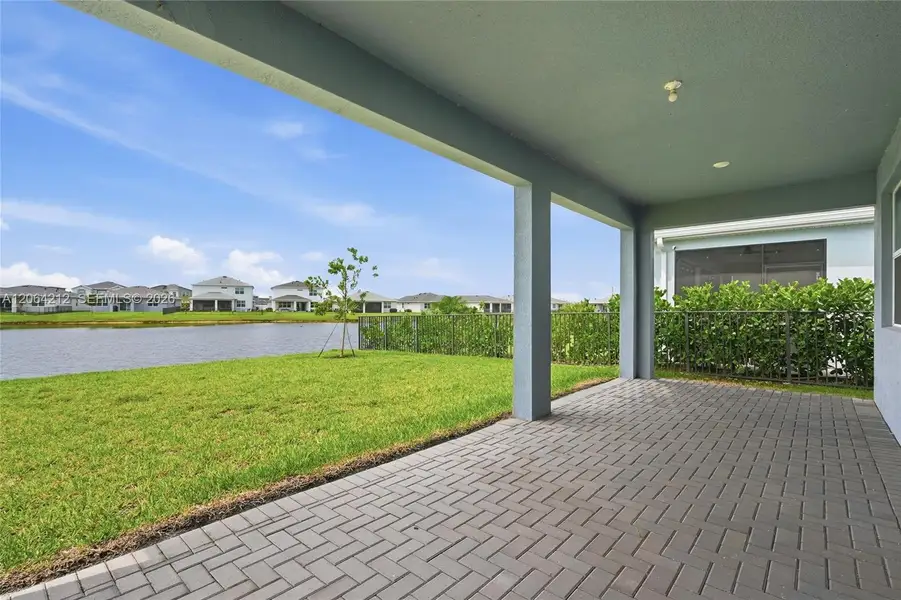 Exterior details and patio area of a home in Tradition, Port St. Lucie (Image 26).