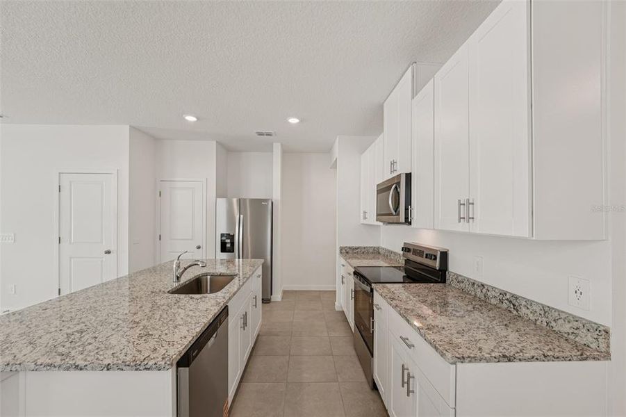 Furnished interior view inside a new home in Flagler Village - Classic Series, Palm Coast (Image 9).