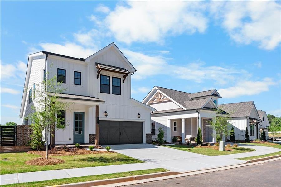 Front exterior of a new home in Aberdeen, Hoschton, GA, highlighting curb appeal (Image 23). Front exterior of a new home in Aberdeen, Hoschton, GA, highlighting curb appeal (Image 23).