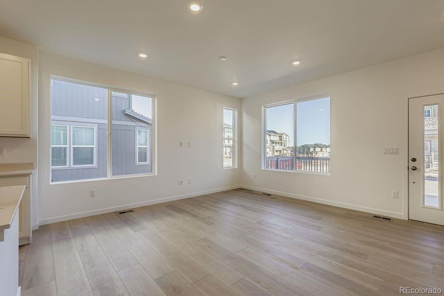 Spacious, unfurnished interior of a new home in Parterre: The Parkside Collection, Thornton (Image 10).