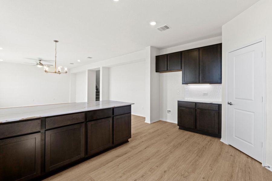 Furnished interior view inside a new home in Salerno - Classic Collection, Round Rock (Image 7). Furnished interior view inside a new home in Salerno - Classic Collection, Round Rock (Image 7).