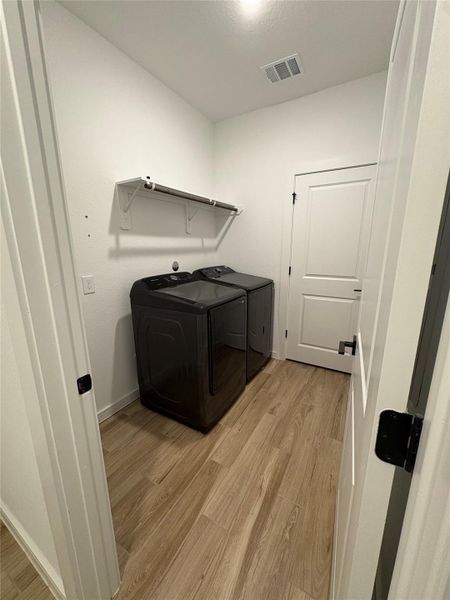 Furnished interior view inside a new home in , Cypress (Image 6).