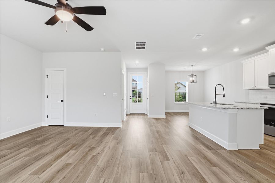 Spacious, unfurnished interior of a new home in Whisper Valley, Manor (Image 20).