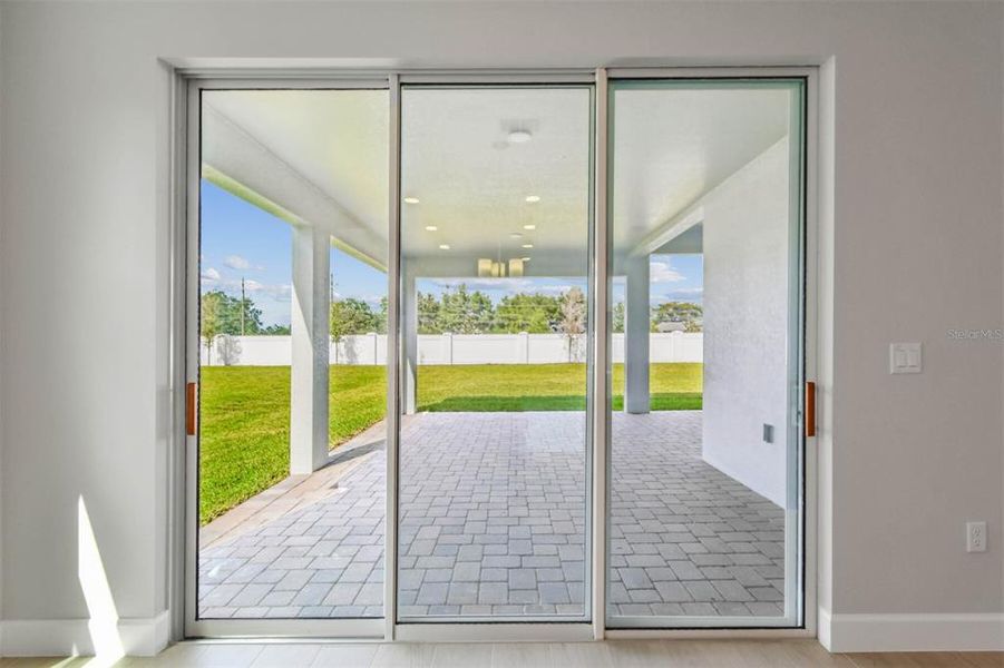 Exterior details and patio area of a home in Solace at Corner Lake, Orlando (Image 35).