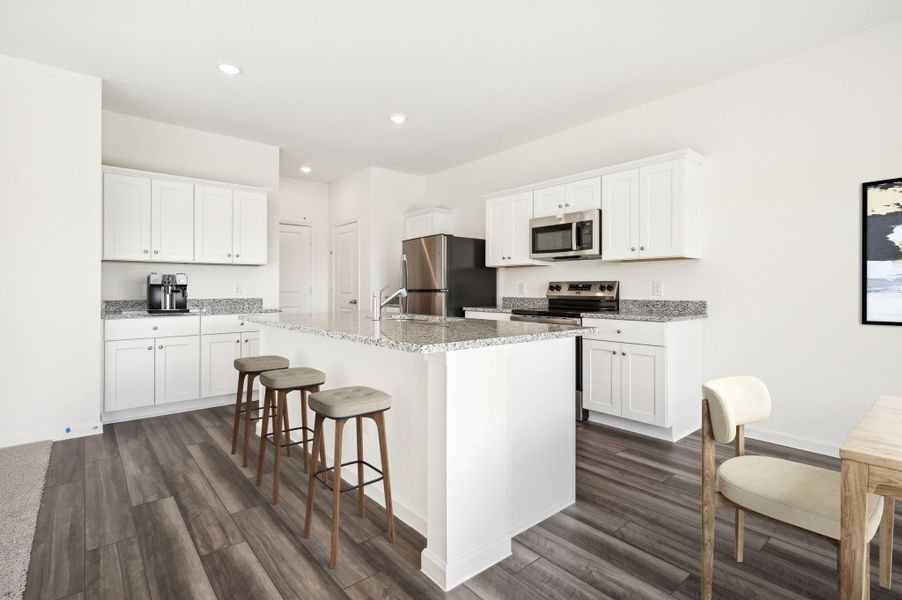 Representative furnished interior of a home built from the Discovery by Starlight Homes in Royal Pines, Porter (Image 3).