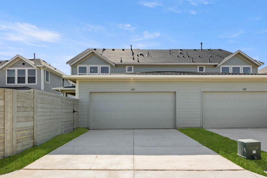 Exterior details and patio area of a home in Terrace Collection at Harvest, Argyle (Image 1).
