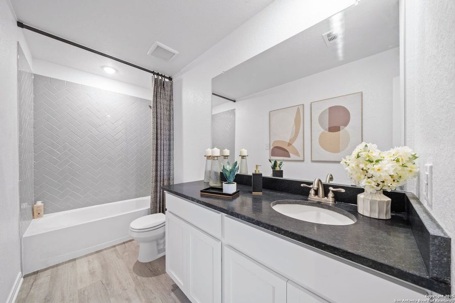 Furnished interior view inside a new home in Applewhite Meadows, San Antonio (Image 40). Furnished interior view inside a new home in Applewhite Meadows, San Antonio (Image 40).