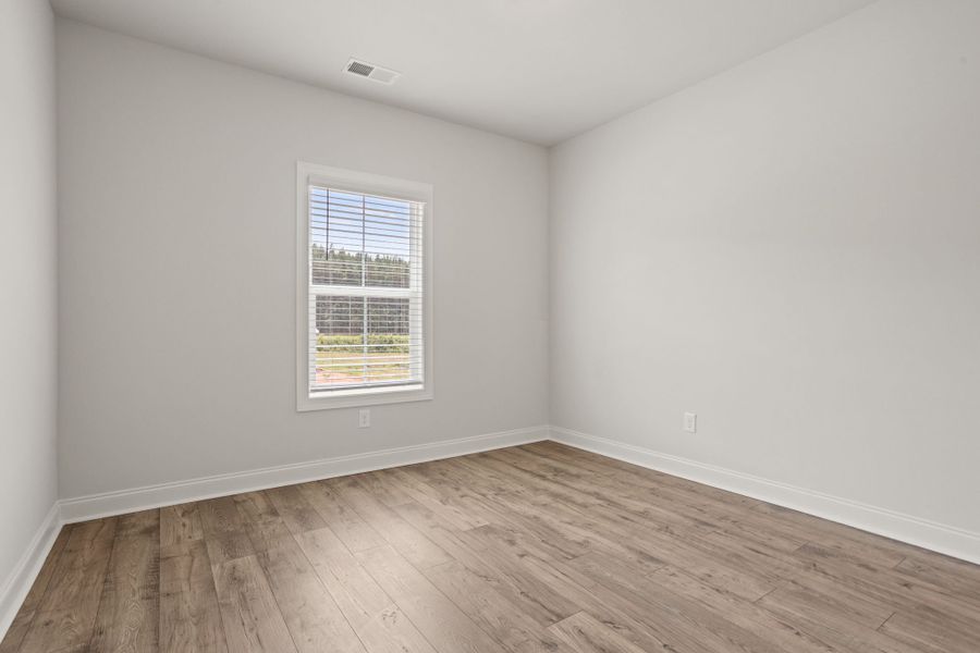 Spacious, unfurnished interior of a new home in Cherokee Knoll, Williamston (Image 27).