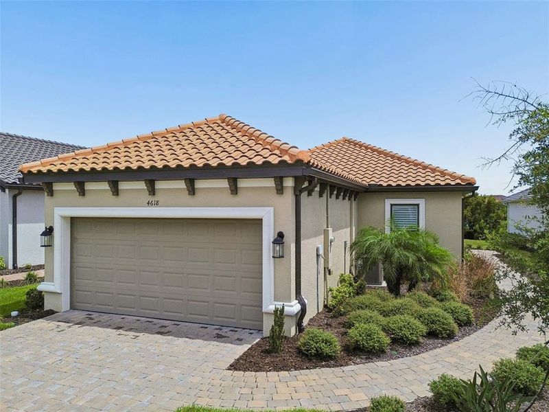 Front exterior of a new home in , Wesley Chapel, FL, highlighting curb appeal (Image 2). Front exterior of a new home in , Wesley Chapel, FL, highlighting curb appeal (Image 2).