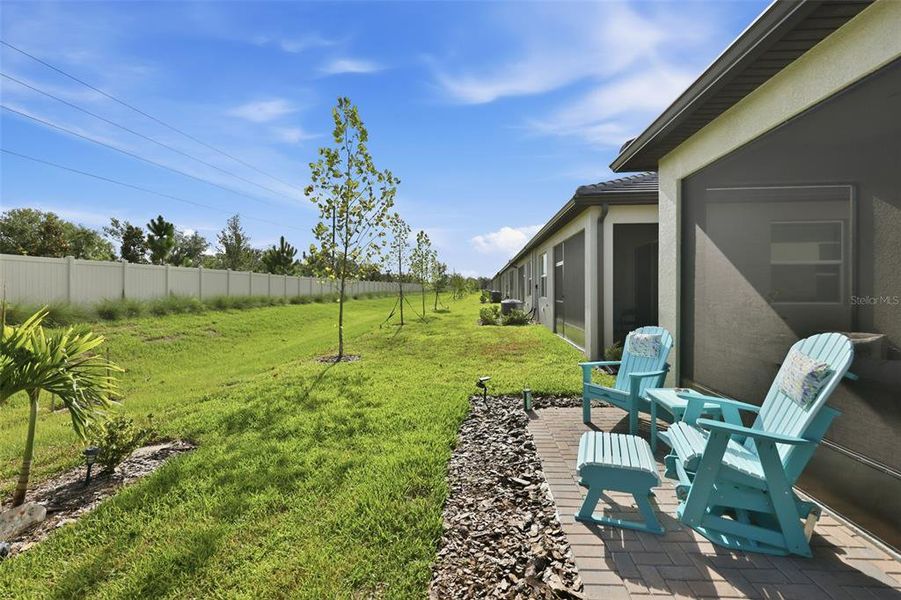 Exterior details and patio area of a home in Prosperity Lakes Active Adult, Parrish (Image 26).