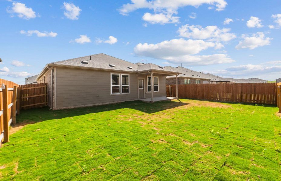 Exterior details and patio area of a home in Lagos, Manor (Image 16).