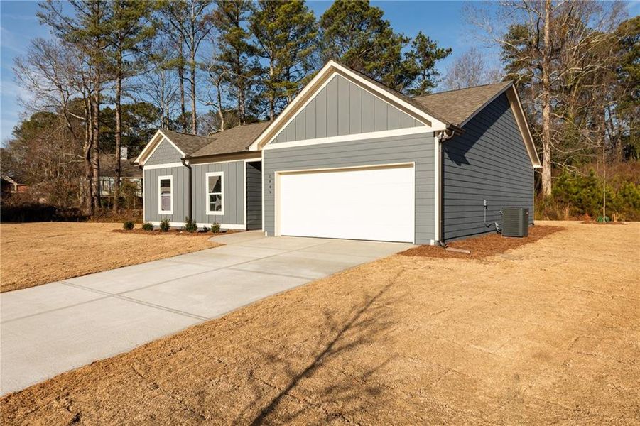 Front exterior of a new home in , Lawrenceville, GA, highlighting curb appeal (Image 18).