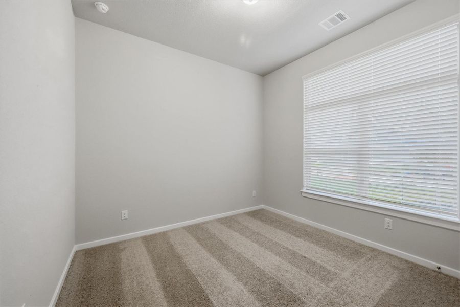 Spacious, unfurnished interior of a new home in Canterra Creek  60', Iowa Colony (Image 20).