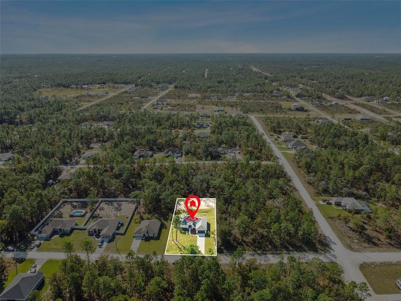 Front exterior of a new home in , Weeki Wachee, FL, highlighting curb appeal (Image 39). Front exterior of a new home in , Weeki Wachee, FL, highlighting curb appeal (Image 39).