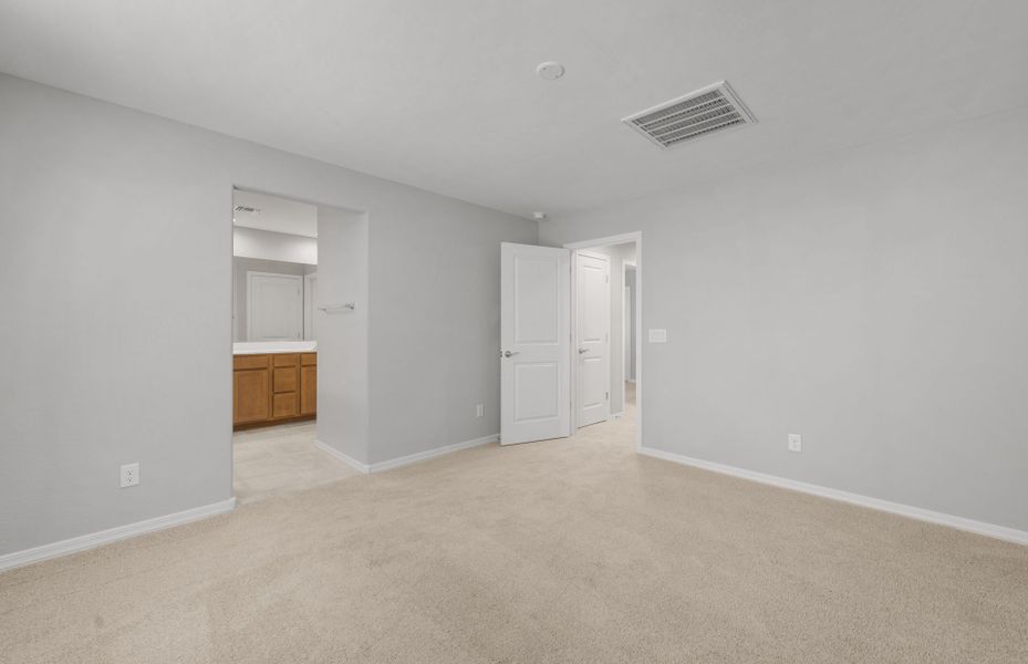 Spacious, unfurnished interior of a new home in Asante- Atrium Series, Surprise (Image 19).