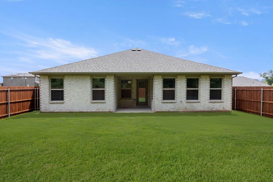 Representative exterior photo of a completed home built from the Boston by Impression Homes in Keeneland, Aubrey, TX (Image 24).