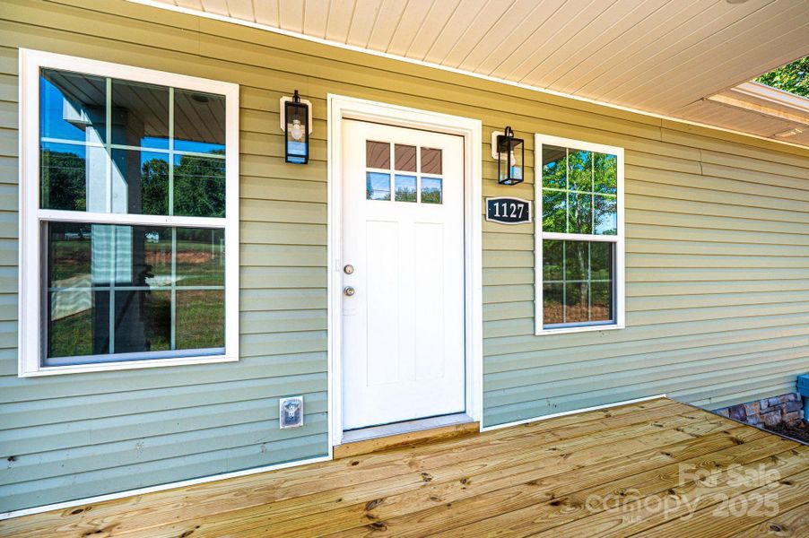 Front exterior of a new home in , Newton, NC, highlighting curb appeal (Image 22).